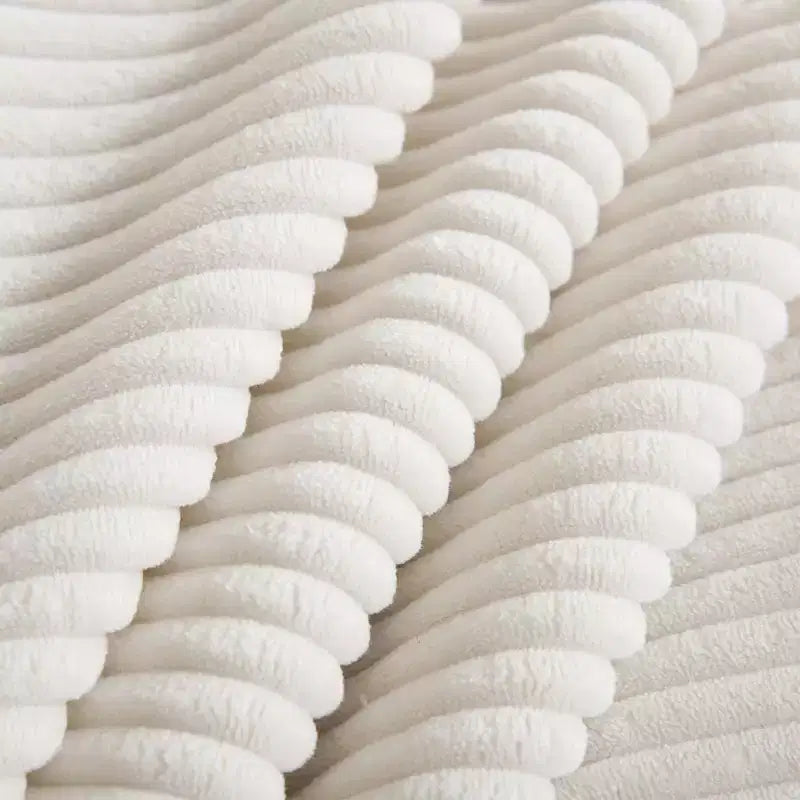 Divano: Divano profondo in velluto a coste beige per un living moderno